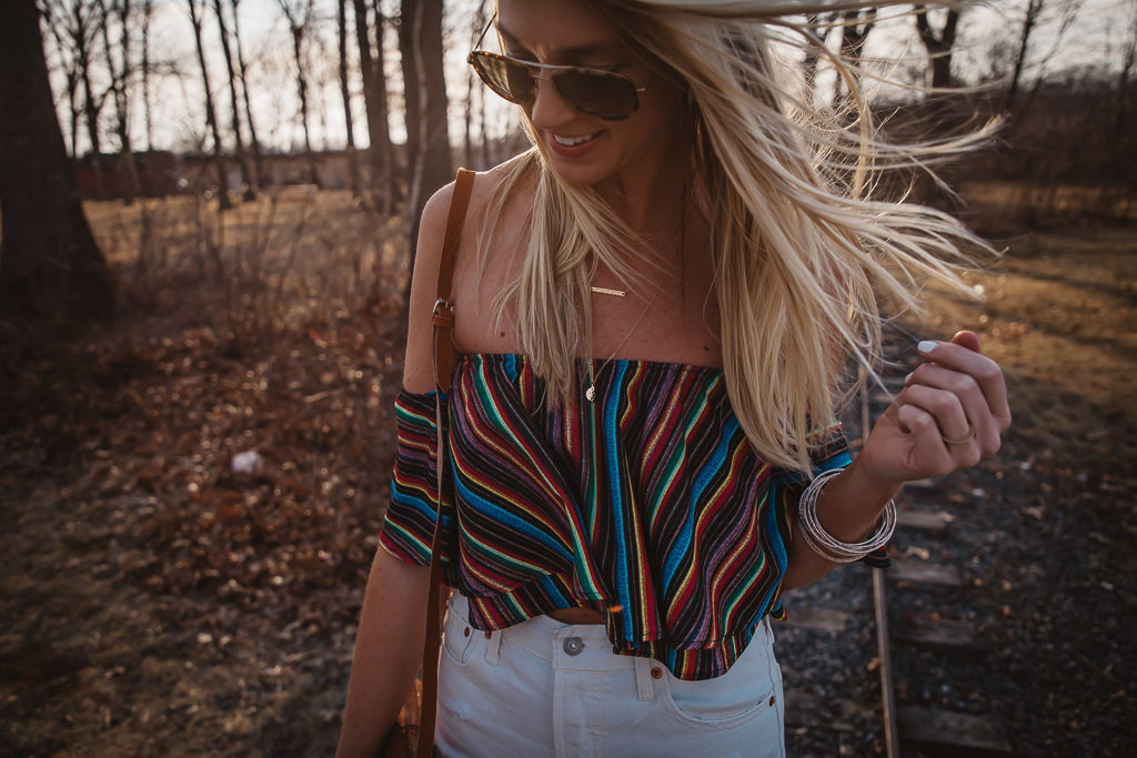 show me your mumu striped off the shoulder top and white levis cutoffs with brown bag and straw Splendid sandals. layered necklaces and bracelets