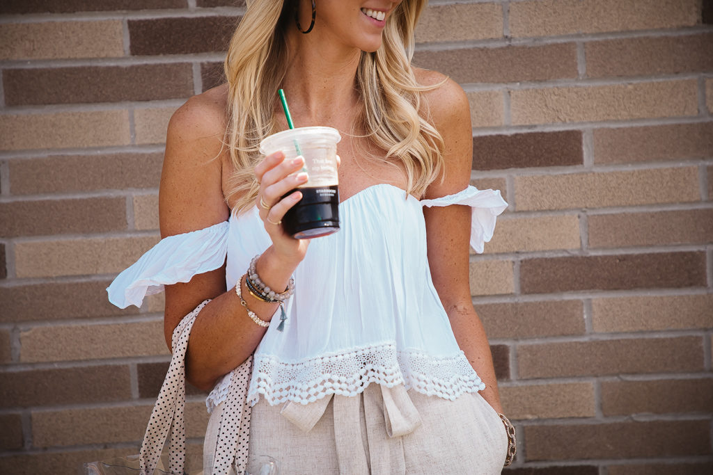 white off the shoulder eyelet and show me your mumu linen tie waist shorts.
